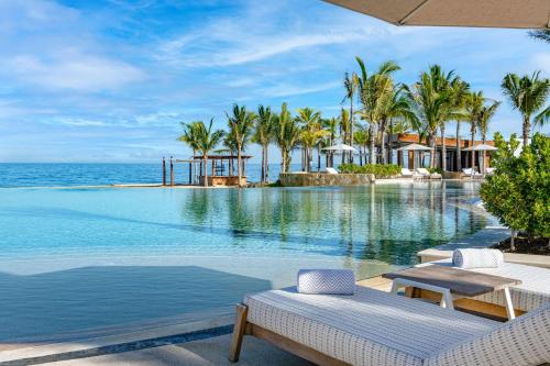 Conrad Punta de Mita luxury resort with modern architecture, beachfront pools, and upscale amenities on Mexico's Riviera Nayarit.