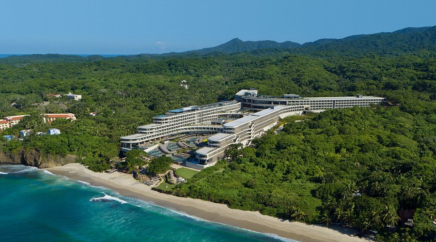 Dreams Bahia Mita Surf & Spa Resort family-friendly all-inclusive in Riviera Nayarit with beachfront pools, kids club, and surf activities.