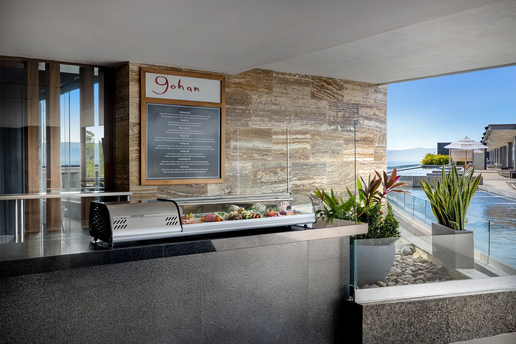 Gohan Sushi Bar at Secrets Bahia Mita Surf & Spa Resort featuring an open-air sushi counter with ocean views and freshly prepared rolls.