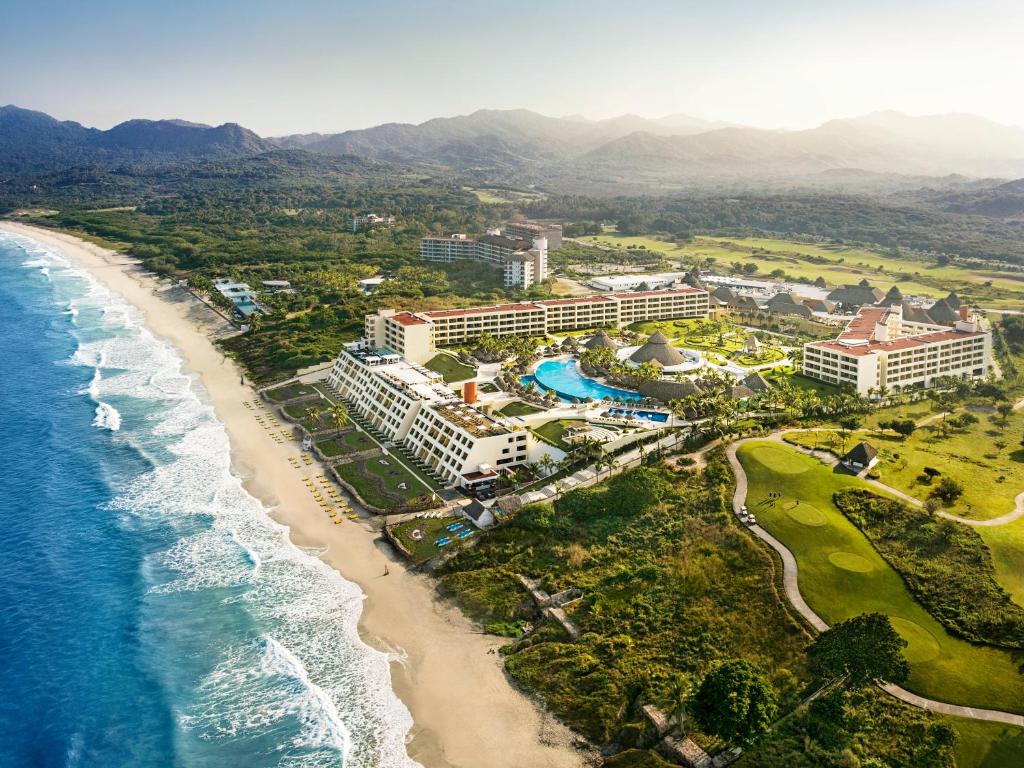 Iberostar Selection Playa Mita family-friendly all-inclusive resort with beachfront pools, lush grounds, and Pacific Ocean views in Riviera Nayarit.