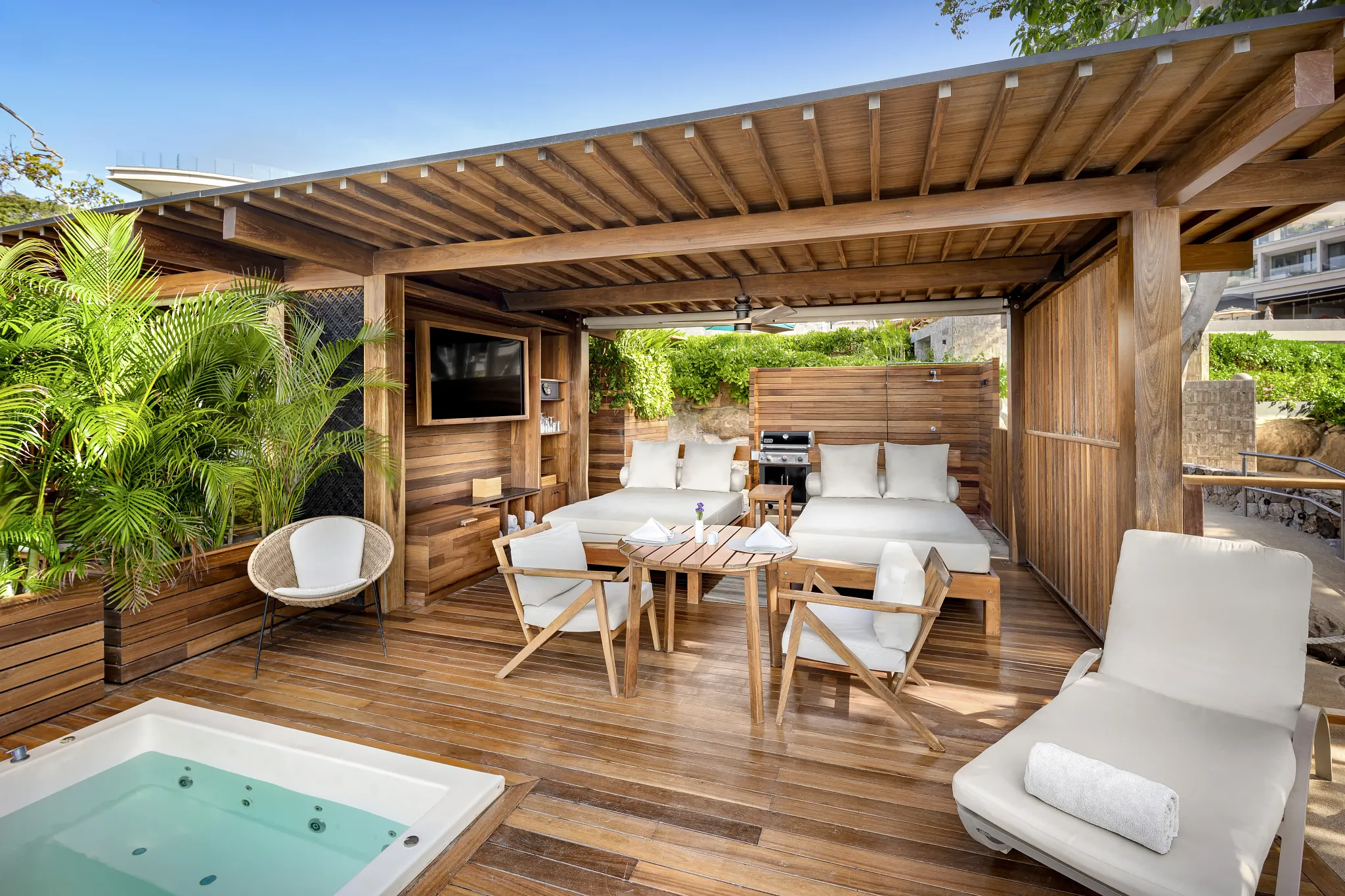 Private Marietas cabin with outdoor seating and whirlpool at Secrets Bahia Mita Surf & Spa Resort.