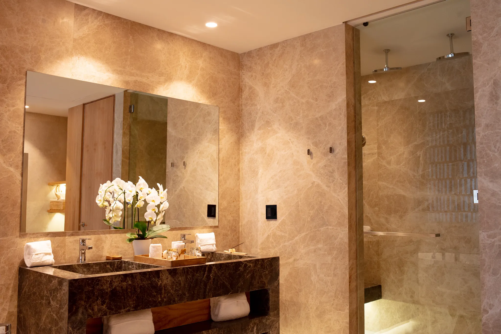 Preferred Club Ambition Suite Panoramic View bathroom with double vanity and glass-enclosed shower at Secrets Bahia Mita Surf & Spa Resort.