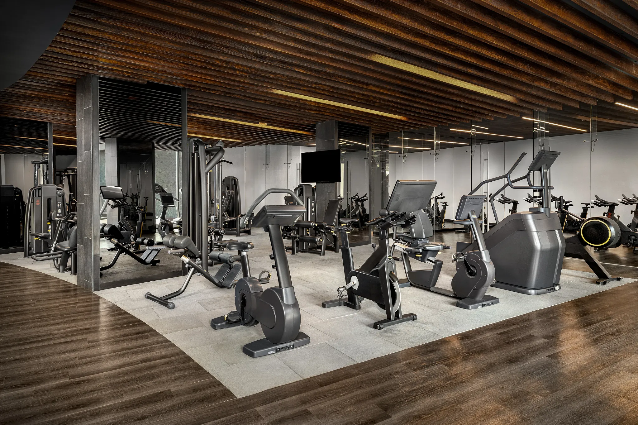 State-of-the-art gym with cardio and strength equipment at Secrets Bahia Mita Surf & Spa Resort.